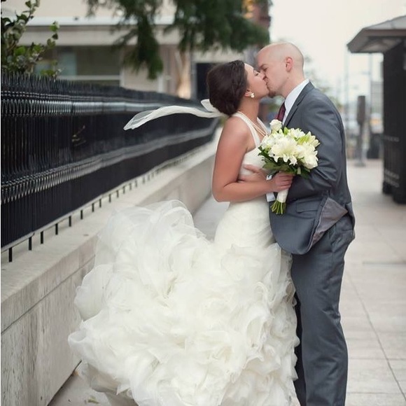 Size 8 White by Vera Wang ivory wedding dress. Worn once preserved and stored.